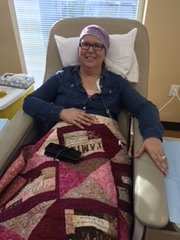 During her treatment, Dawn Hensley had to go through two different types of chemotherapy. Hensley said having a positive attitude as shown in her smile here helped carry her through various medical procedures to get rid of her breast cancer.